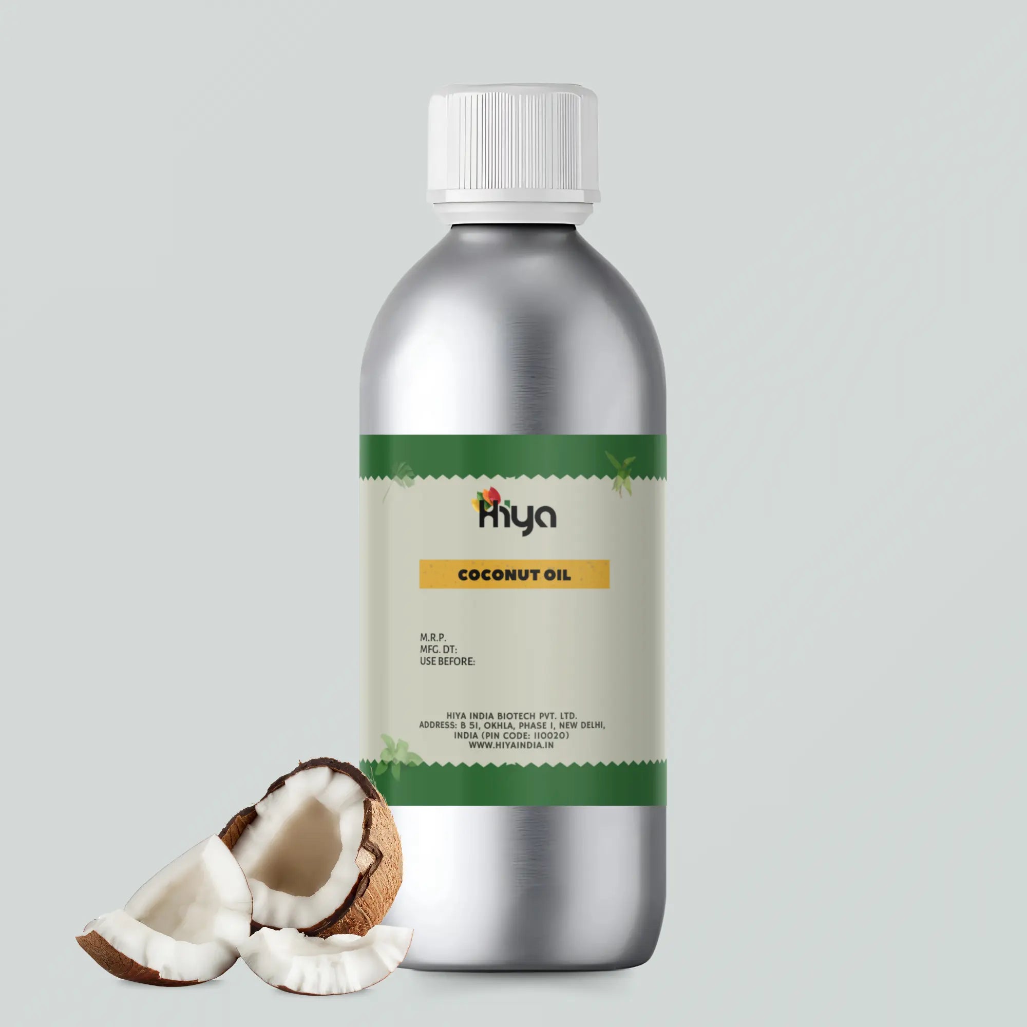 Hiya Coconut Oil bottle with metallic finish and white cap, labeled "Hiya Coconut Oil," displayed alongside cracked coconut pieces.