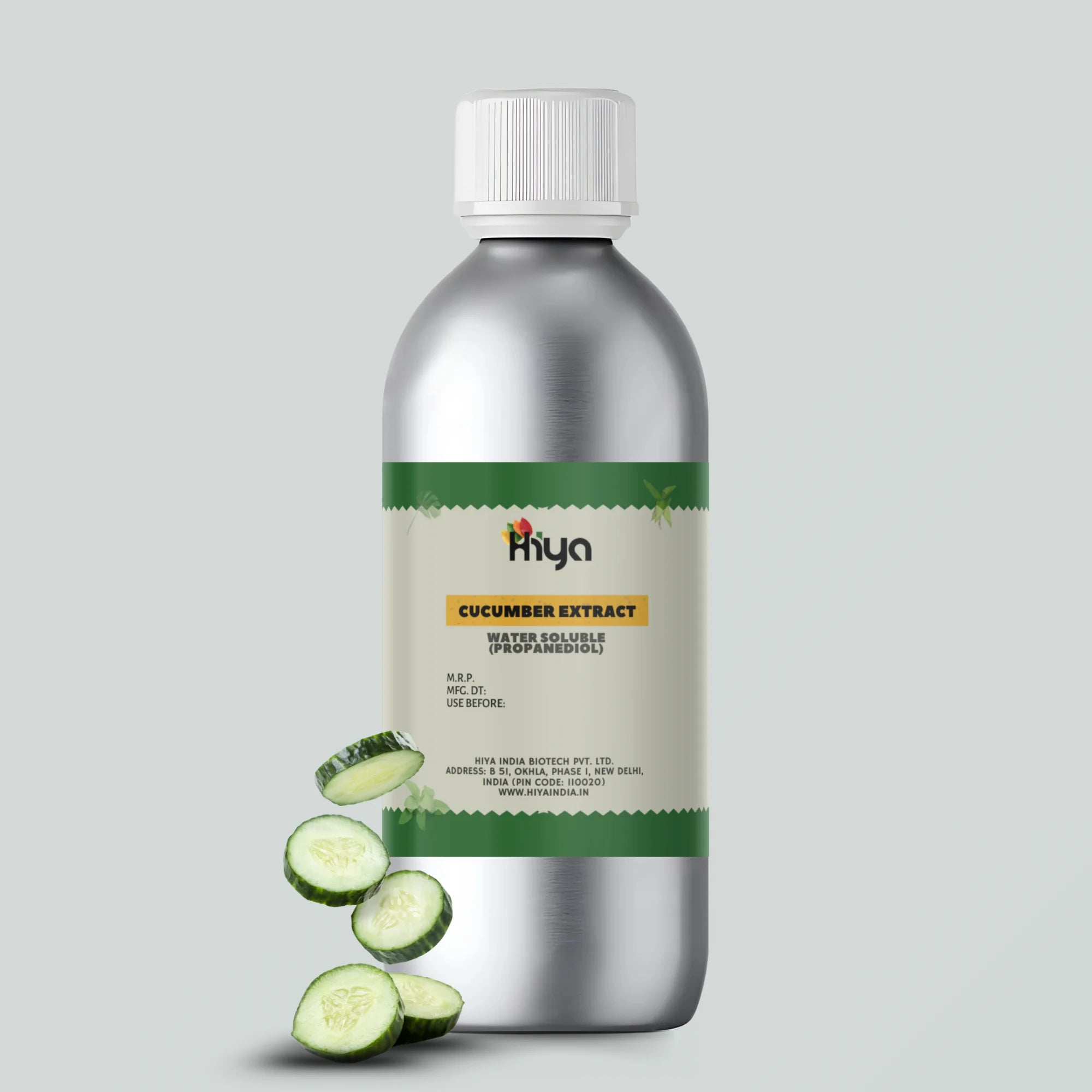 A metallic bottle labeled "Hiya Cucumber Extract Water Soluble (Propanediol)" with a green and beige label. The label contains product details, including pricing, manufacturing, and expiry information. In front of the bottle, there is a stack of fresh cucumber slices.