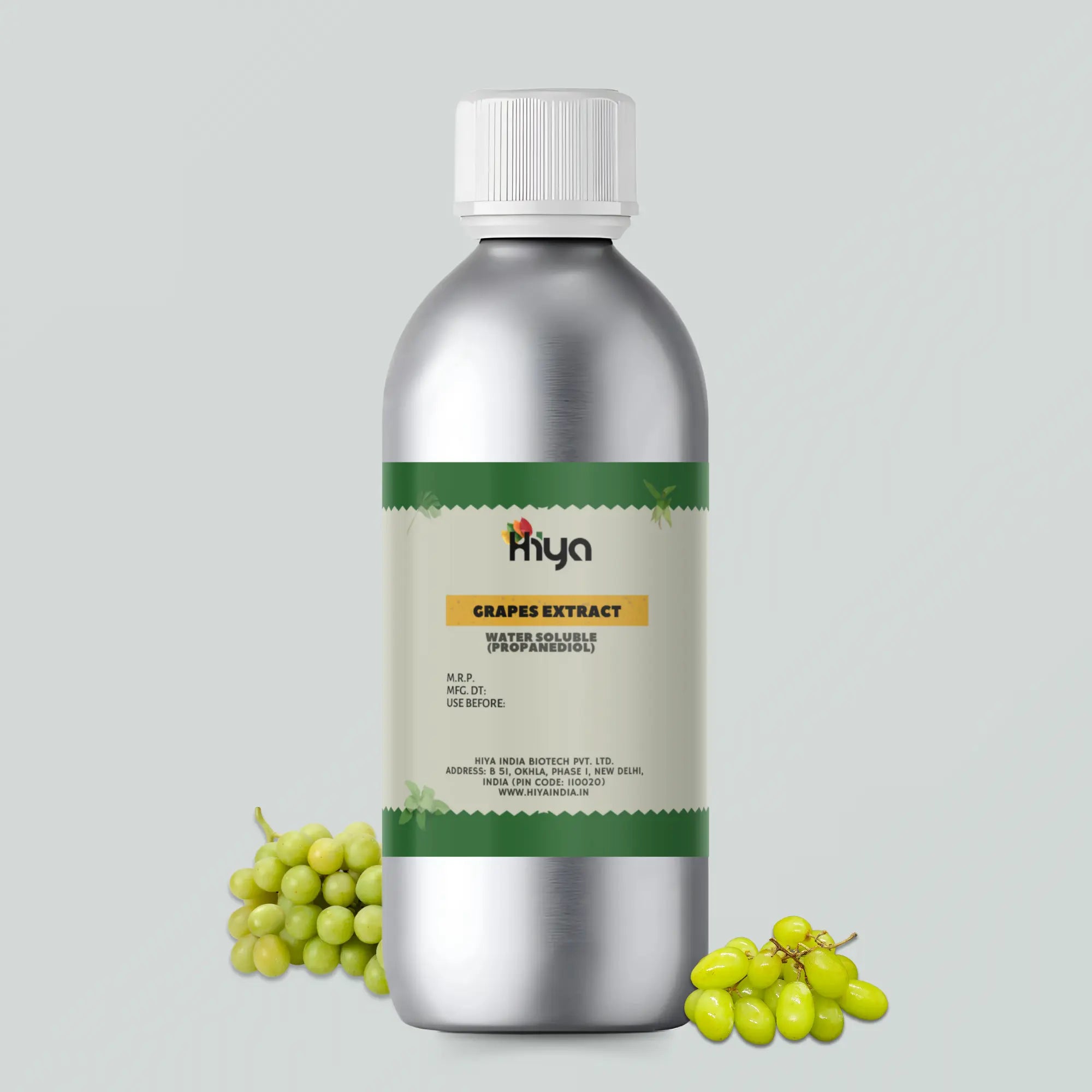 Hiya Grapes Extract Water Soluble in a metallic bottle labeled with product details and placed next to fresh green grape clusters.