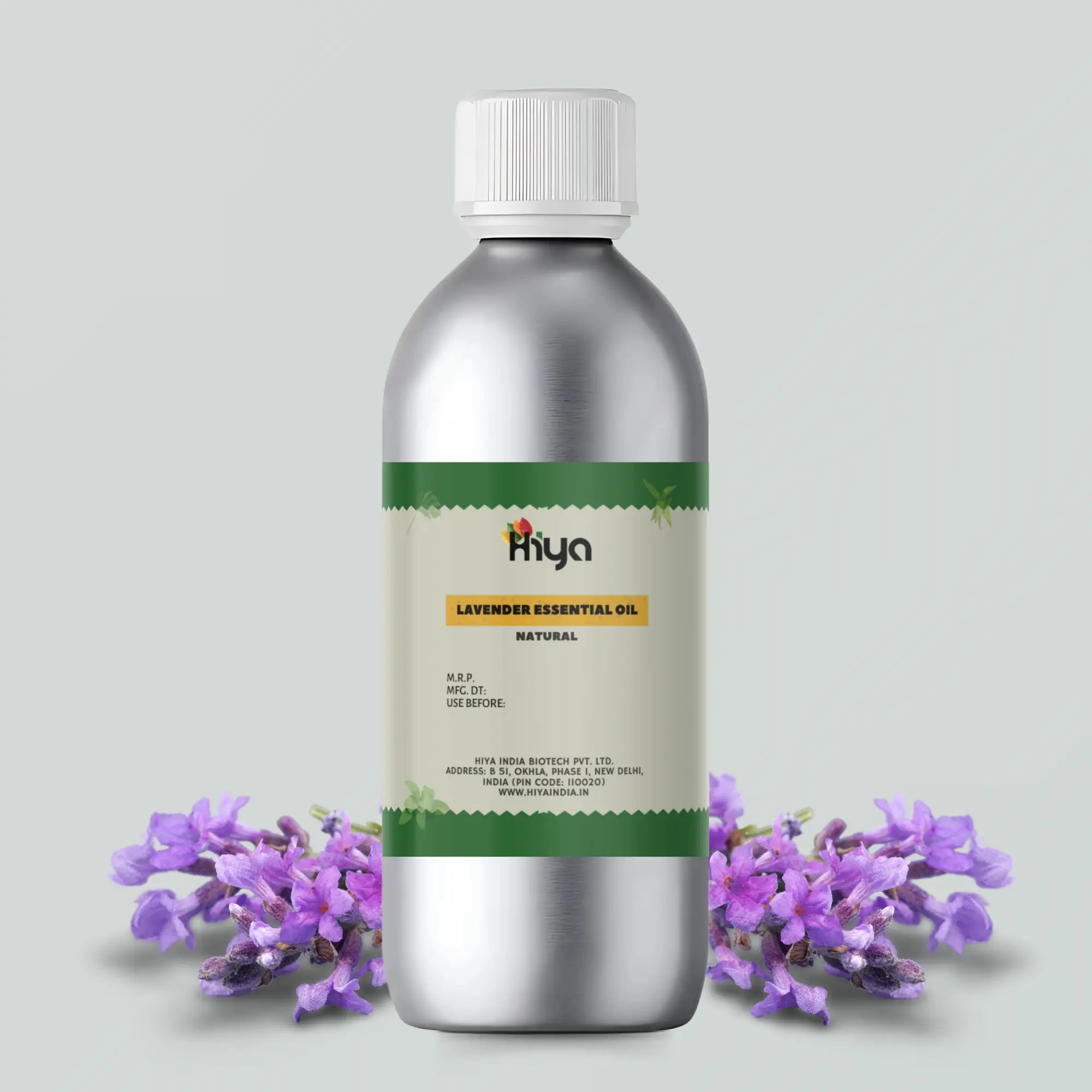 A silver metallic bottle filled with natural lavender essential surrounded by lavender flowers.