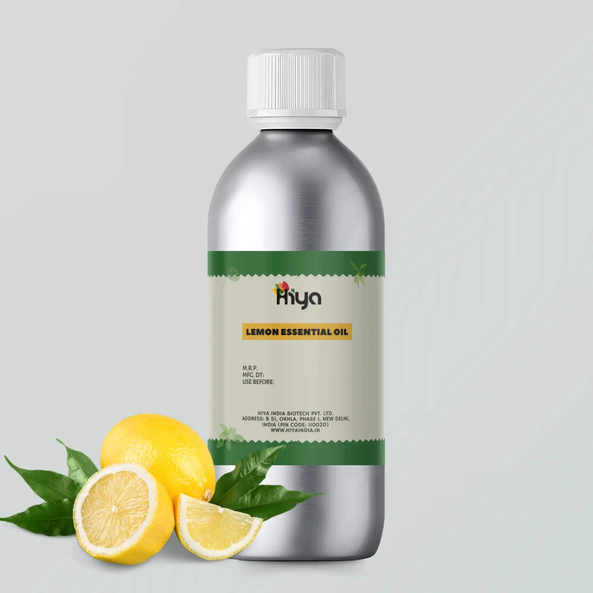 A silver bottle with a white cap labeled 'Hiya Lemon Essential Oil' with two lemons, one half lemon with leaves behind on the right side.