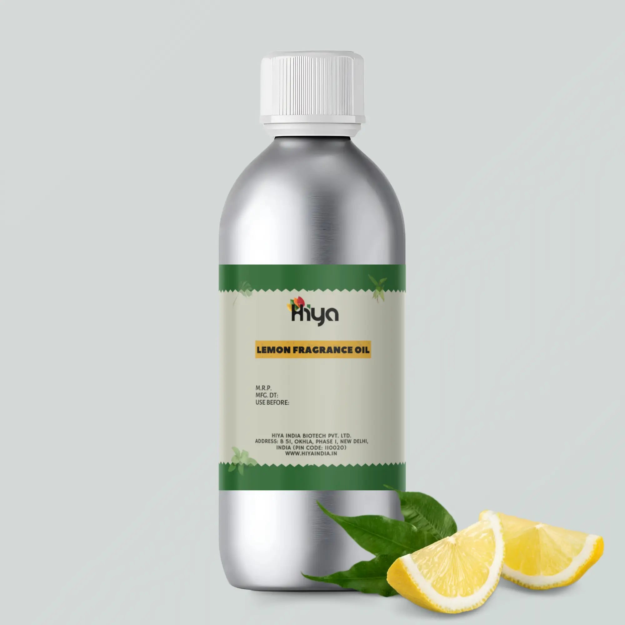 A silver bottle labeled 'Hiya Lemon Fragrance Oil' with a white cap, accompanied by lemon slices and green leaves at the base.