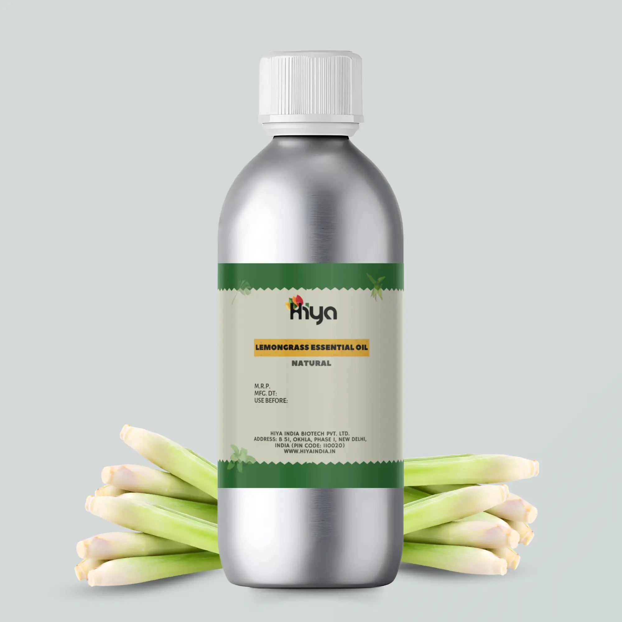 Metallic bottle with white cap, labeled "Hiya Lemongrass Essential Oil - Natural," displayed alongside fresh lemongrass stalks.