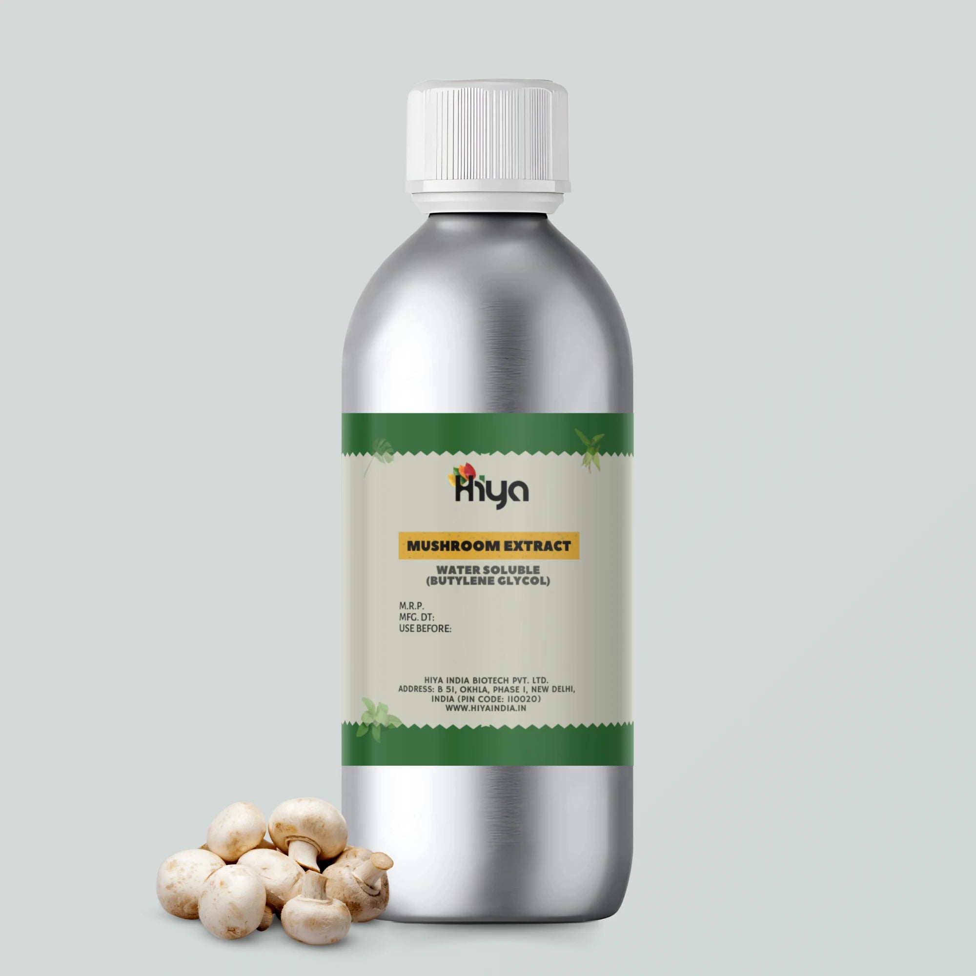 A metallic bottle labeled "Hiya Mushroom Extract Water Soluble (Butylene Glycol)" with a silver cap. Beside the bottle, a few fresh mushrooms are placed to represent the extract’s natural source.