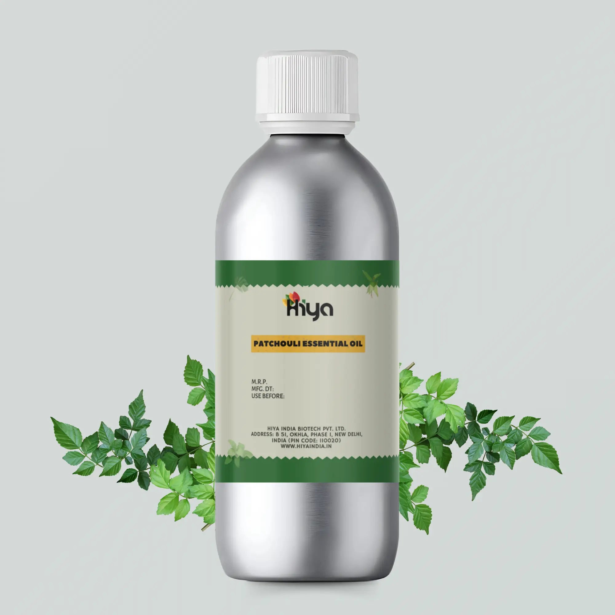 Hiya India's patchouli essential oil bottle with patchouli leaves behind from left and right side.