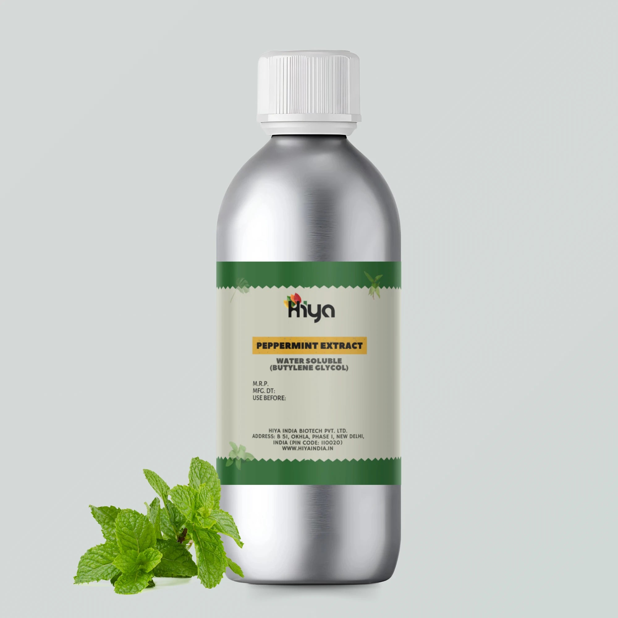 A metallic bottle labeled "Hiya Peppermint Extract Water Soluble (Butylene Glycol)" with a silver cap. A fresh sprig of peppermint leaves is placed in front of the bottle.