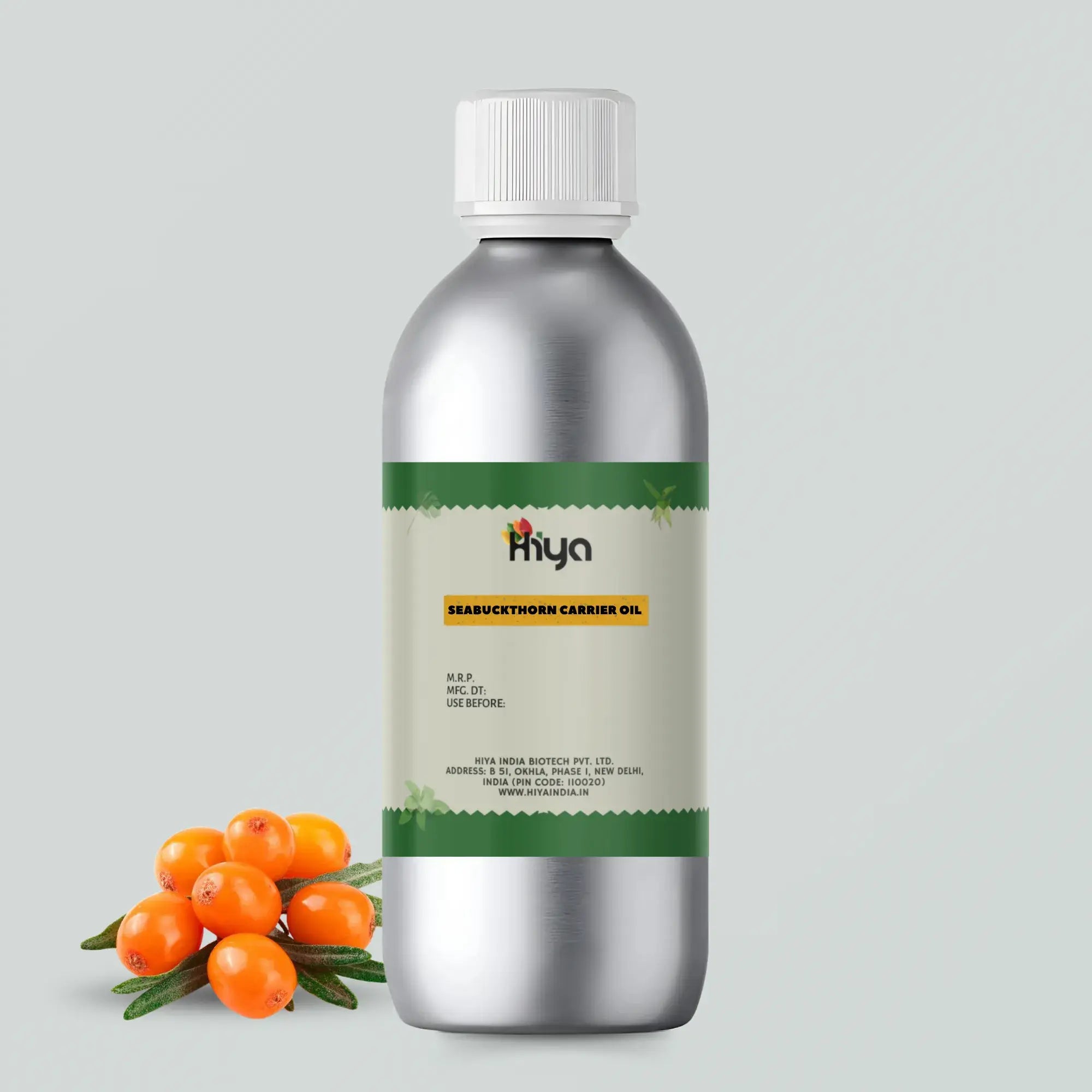 Silver bottle of Hiya seabuckthorn carrier oil with berries on a light gray background